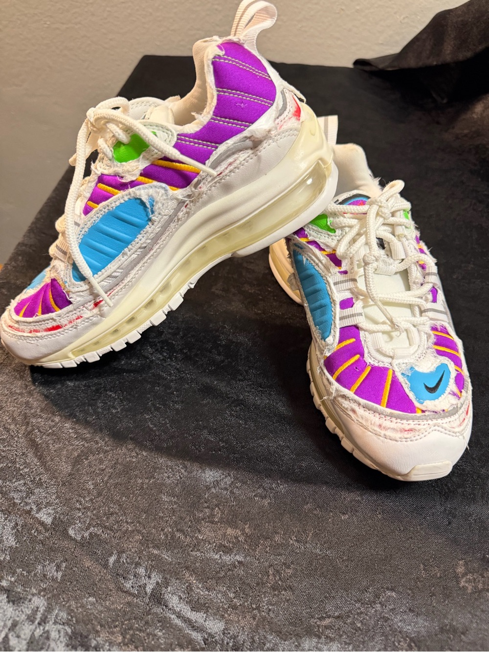 Nike White Sneakers with Purple, Blue, Green and Yellow Accents